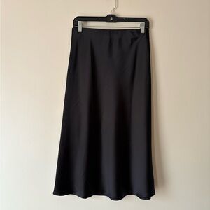 Renee C. Elegant Black Midi Skirt